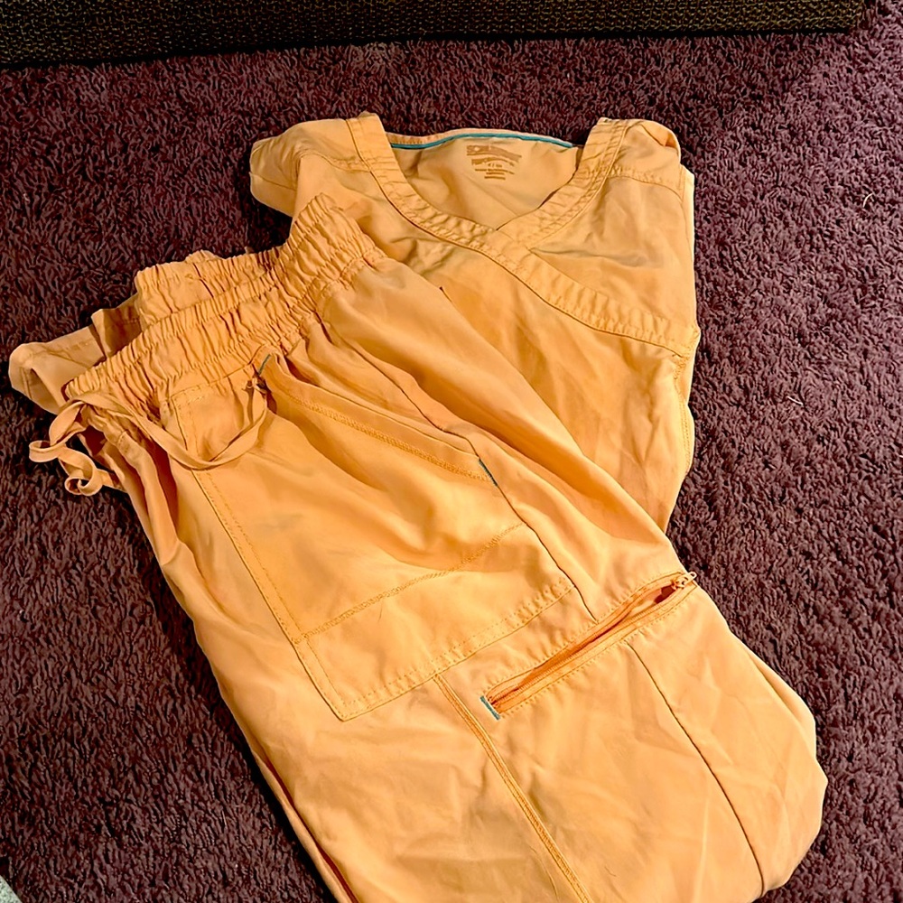 Peach colored scrubs